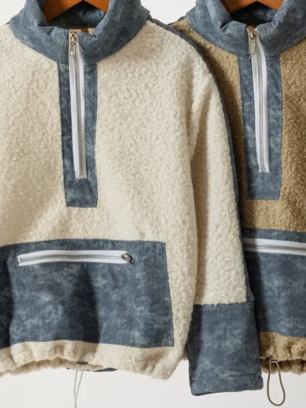 Buzo combinado beige y jeans